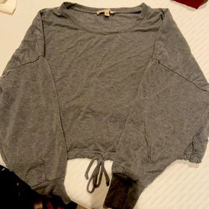 Gray cropped tired bottom cut off sweatshirt